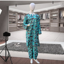 Aqua floral printed plus-size 2PC stitched lawn suit displayed on mannequin with shirt and trouser