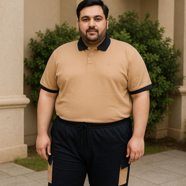 Plus-size Pakistani man wearing a tan and black cargo tracksuit, featuring a polo jersey top and terry pants with side pockets