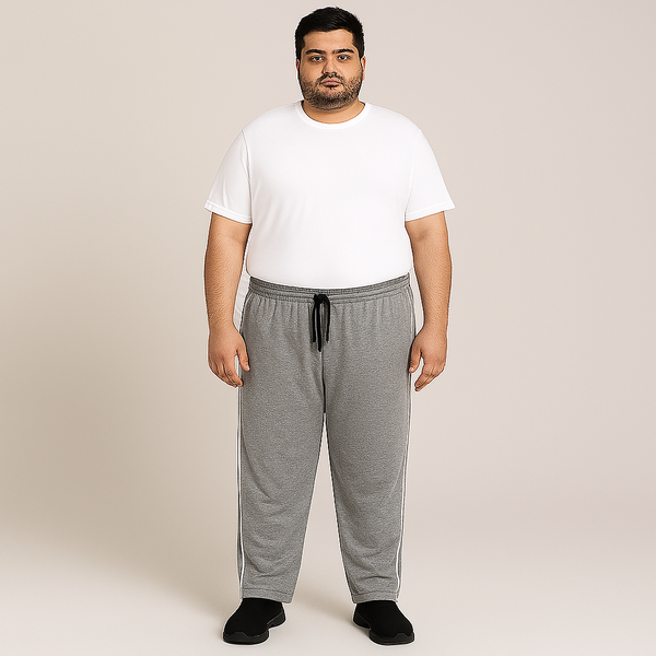 Grey plus size jersey knit trousers with white side piping for men, available in 2XL to 6XL at PlusSize.pk