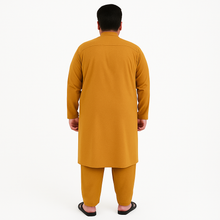 Plus-size man wearing mustard wash & wear kurta pajama – PlusSize.pk