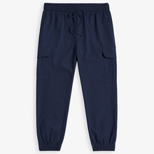 Plus-size man wearing navy twill cotton cargo joggers with side and back pockets