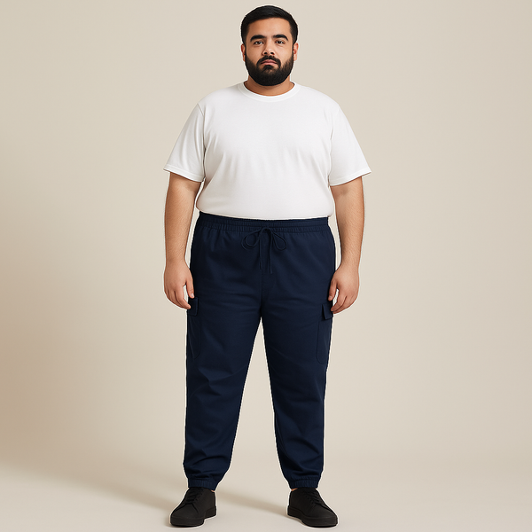 Plus-size man wearing navy twill cotton cargo joggers with side and back pockets