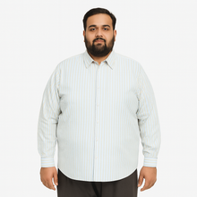 Plus-size Pakistani man wearing off-white formal shirt with sky blue and beige vertical stripes