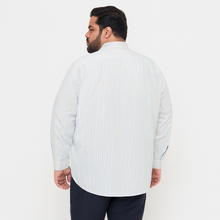 Plus-size Pakistani man wearing off-white formal shirt with sky blue and beige vertical stripes
