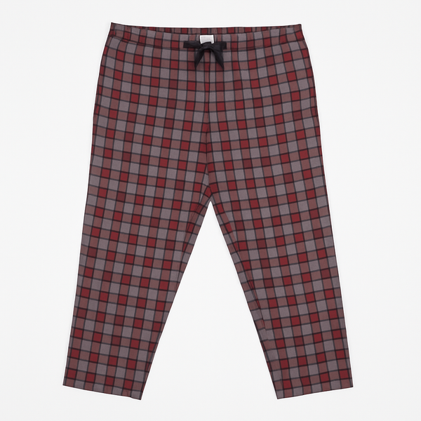 Red and grey plaid plus size lounge trousers with black drawstring, laid flat on a white background
