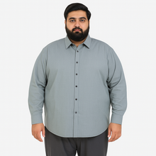 Plus-size Pakistani man wearing slate grey textured formal shirt
