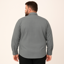 Plus-size Pakistani man wearing slate grey textured formal shirt