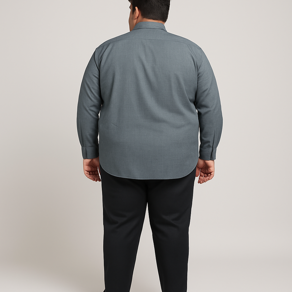 Plus-size Pakistani man wearing steel grey formal shirt with long sleeves