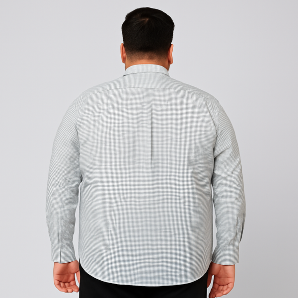 Plus-size Pakistani man wearing white shirt with small black grid check pattern